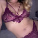 Leslie in St. Louis wears a purple lace lingerie set for a sensual massage.